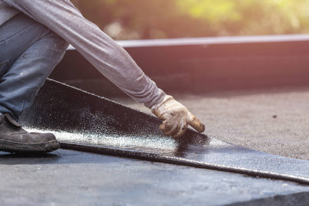 Professional Basement Waterproofing technician working in Morrisonville, NY